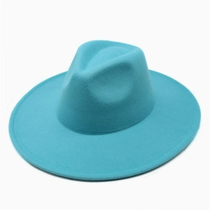 Close-up of a teal wool fedora hat with wide flat brim and classic pinched crown design