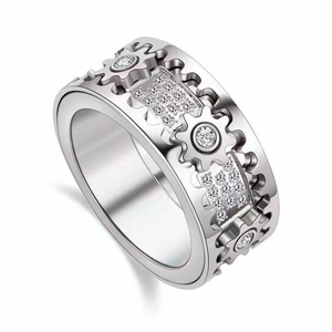 Macro shot of industrial wide gear ring with micro-pave zircons and mechanical aesthetic
