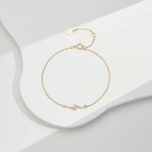Elegant S925 sterling silver gold-plated lightning bolt bracelet with micro-paved zircons