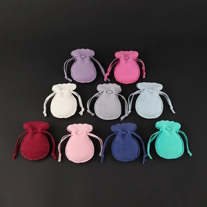 Nine colors of velvet jewelry drawstring pouches with elegant scalloped edges for gift packing