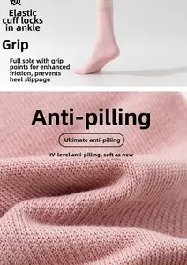 Detail of pink yoga socks showing anti-slip grip sole and elastic ribbed ankle cuffs