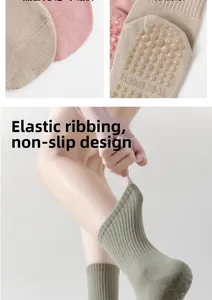 Detailed view of non-slip silicone grippers and ribbed texture on cotton yoga socks