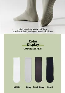 Detail of non-slip yoga socks with grip soles and elastic ribbed cuffs in four colors