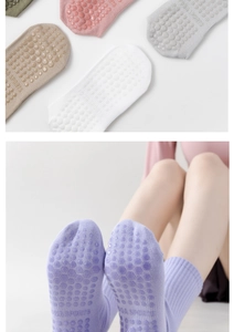 Close-up of anti-slip silicone dots and yoga sports text on cotton fitness socks
