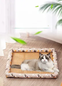 Detail of breathable cooling rattan pet mat with cute cat patterns and fabric borders