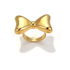 Elegant gold plated stainless steel bow ring for women featuring a minimalist jewelry design