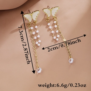 Detailed view of tassel butterfly earrings showing dimensions of 7.3cm length