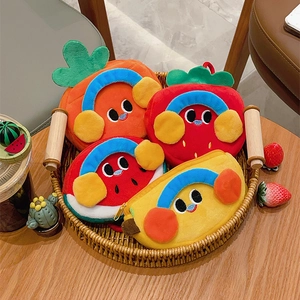 Plush fruit coin purses featuring carrot, strawberry, watermelon and banana designs