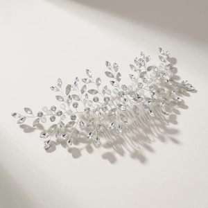 Elegant silver leaf hair comb with rhinestones and white beads for bridal styling