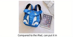 Detailed comparison showing the blue elephant kids backpack size next to a standard tablet