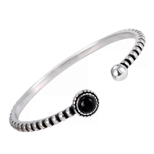 Vintage style silver bangle with round black agate and textured beaded twist design