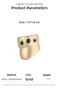 Detail view of gold matte alloy ear cuff with three green rhinestones and size dimensions