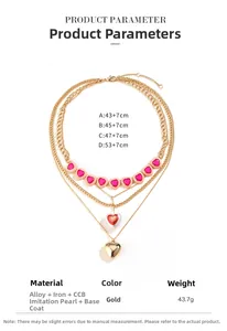 Detail view of multi-layer gold heart necklace showing dimensions and pearl materials
