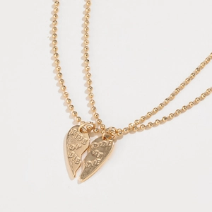 Double-layered gold ball chain necklace with RIDE OR DIE broken heart pendant