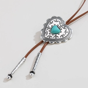 Vintage bolo tie met hartvormige hanger, turquoise steen en bruine leren veter dames
