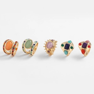 Vintage bohemian gold rings set featuring colorful stones in turquoise and tiger eye style