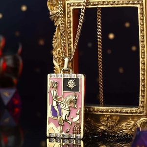 Close-up of golden enamel tarot necklace featuring a knight motif with zircon frame