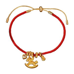 Red braided rope bracelet with golden rocking horse and lucky bag charms for luck