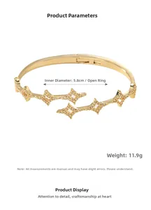 Macro detail of gold-plated star bracelet with cubic zirconia and 5.8cm inner diameter