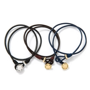 Three multi-layer leather bracelets in black, brown and blue with You Are My World engraving