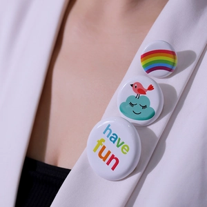 Three-piece colorful rainbow and cartoon enamel pin set on white blazer lapel