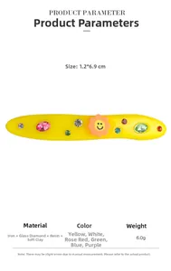 Détail d'une barrette jaune de 6,9 cm avec cristaux colorés et fleur orange souriante