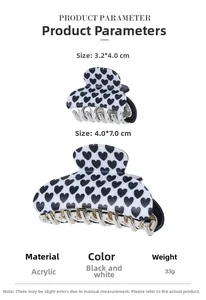 Detail showing dimensions of black and white heart pattern acrylic hair claw clips