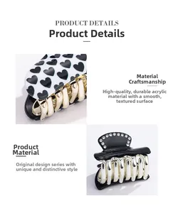 Detailed macro view of acrylic hair claw clips with heart patterns and rhinestone accents