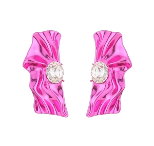 Macro detail of metallic magenta wrinkled statement earrings with oval crystal stones