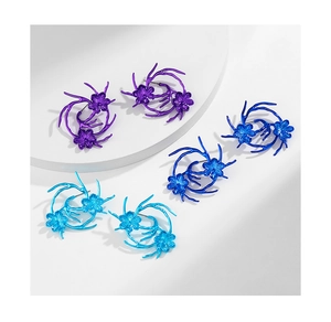 Detailed set of three colorful metallic floral stud earrings in purple, blue, and cyan