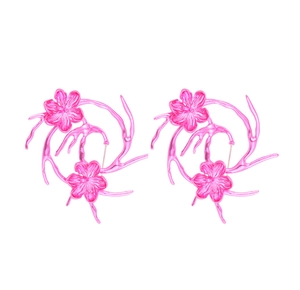 Detail view of pink metallic floral earrings featuring 3D petals and cyber branch design