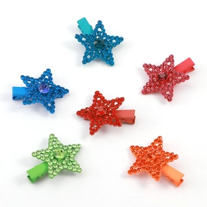 Set of six colorful rhinestone star hair clips with matte rainbow rubber paint finish