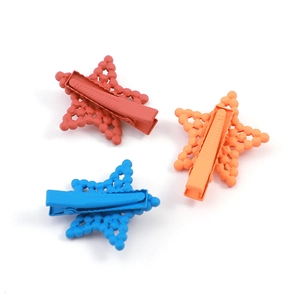Rainbow star hair clips with rubber paint finish and crystals in red orange and blue