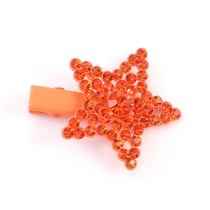 Sparkling orange star hair clip with rhinestones and matte finish duckbill alligator grip