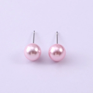 Detailed close-up of elegant 8mm pink glass pearl stud earrings with polished finish