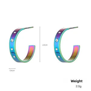 Detail view of iridescent metal hoop earrings with dimensions 2.0cm height and 0.4cm width