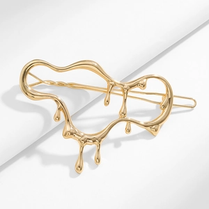 Pince à cheveux en métal fondu doré au design géométrique minimaliste élégant