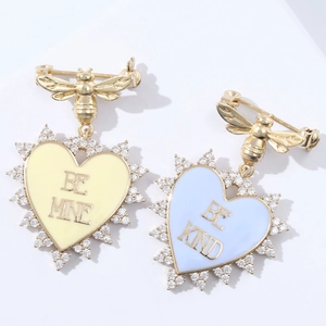 Bee heart enamel brooch set with Be Mine Be Kind text and white zircon crystals