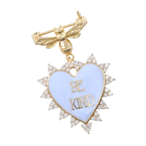 Detail of gold bee brooch with blue enamel heart pendant and 'BE KIND' inscription