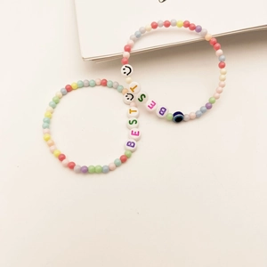 Set de bracelets en perles macaron avec lettres 'BESTIE' et pendentif œil protecteur