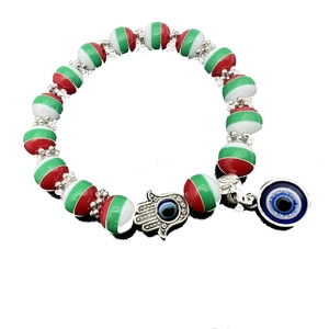Christmas colored beaded Hamsa Hand and Evil Eye stretch bracelet in red white and green