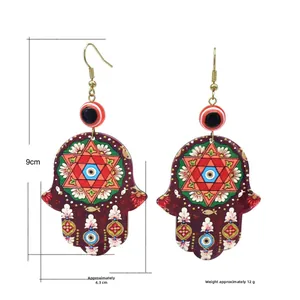 Pendientes bohemios Mano de Fátima con diseño ojo turco y estampado floral