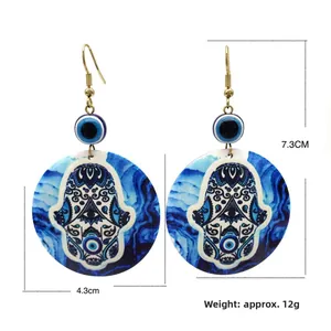 Pendientes bohemios con Ojo de la Suerte y Mano de Fátima con estampado azul