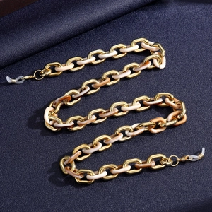 Detail view of colorful acrylic glasses chain with gold UV plating and metal lobster clasps
