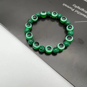Bohemian Evil Eye beaded bracelet featuring green malachite texture stones for women