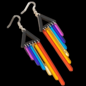Rainbow acrylic drop earrings with black geometric triangle and silver hooks on black base