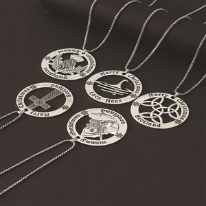 Set of retro silver Scottish necklaces with Celtic knot, Thistle and Loch Ness pendants