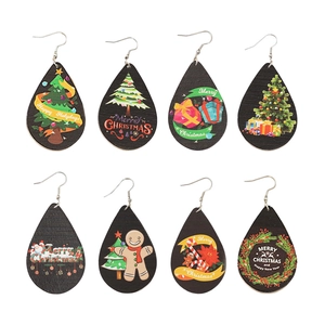 Christmas teardrop earrings set with various cartoon patterns in festive wood designs