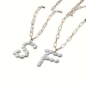Golden paperclip chain necklaces with S and F letter pendants inlaid with baroque pearls