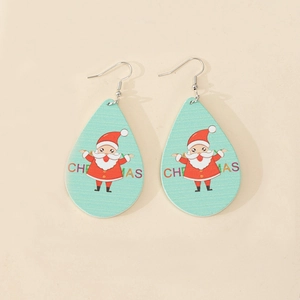 Detailed close-up of water drop wooden earrings featuring Santa Claus and Christmas text